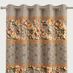 Floral patterned curtain with decorative trim on a plain background